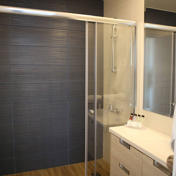 bathroom with large shower cabin in a two bedrooms superior apartment in plakias, rethymno, crete