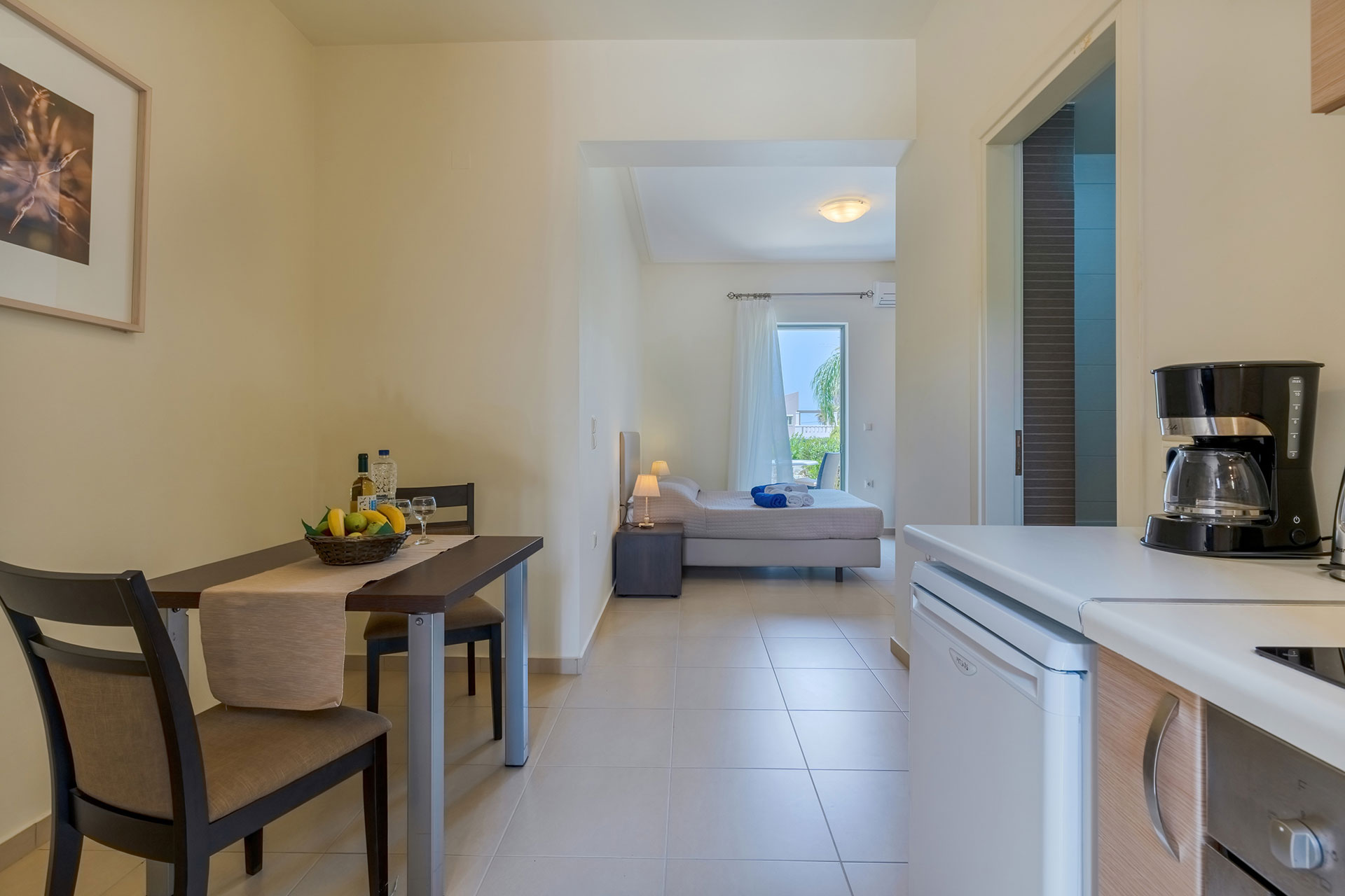 kitchen and bedroom in a studio in plakias, rethymno, crete