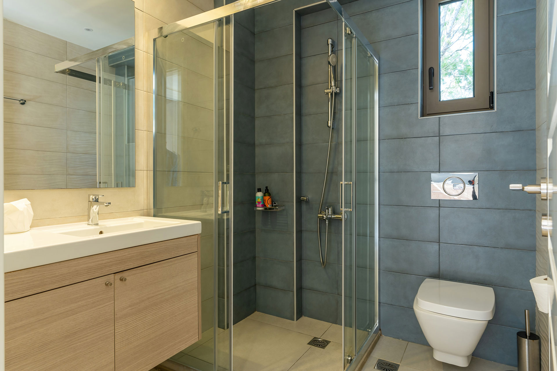 bathroom with shower in an one bedroom apartment in plakias, rethymno, crete