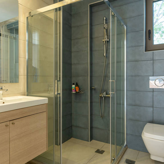 bathroom with shower in an one bedroom apartment in plakias, rethymno, crete