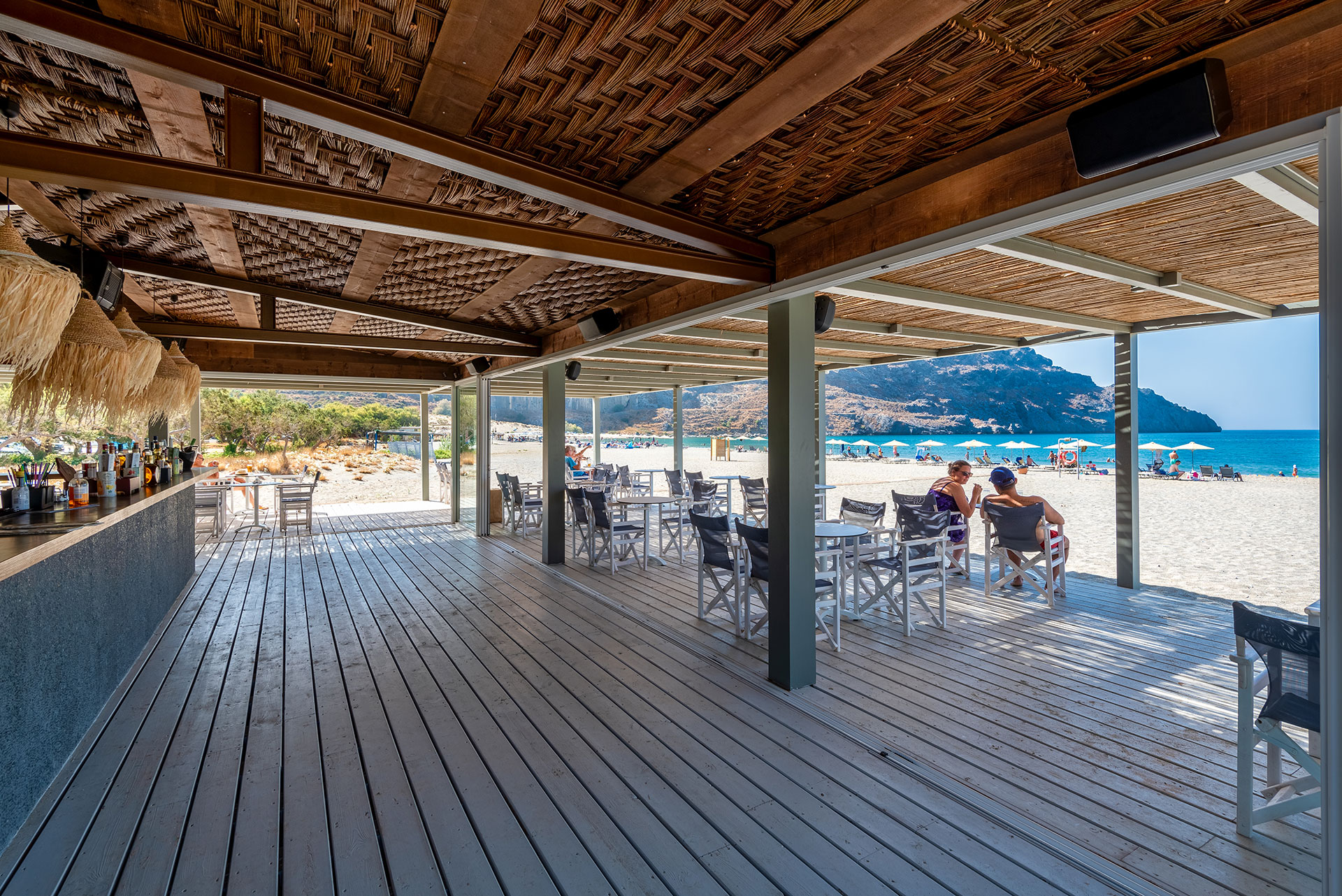 Plakias Resort Rethymno beach bar with tables and sandy beach