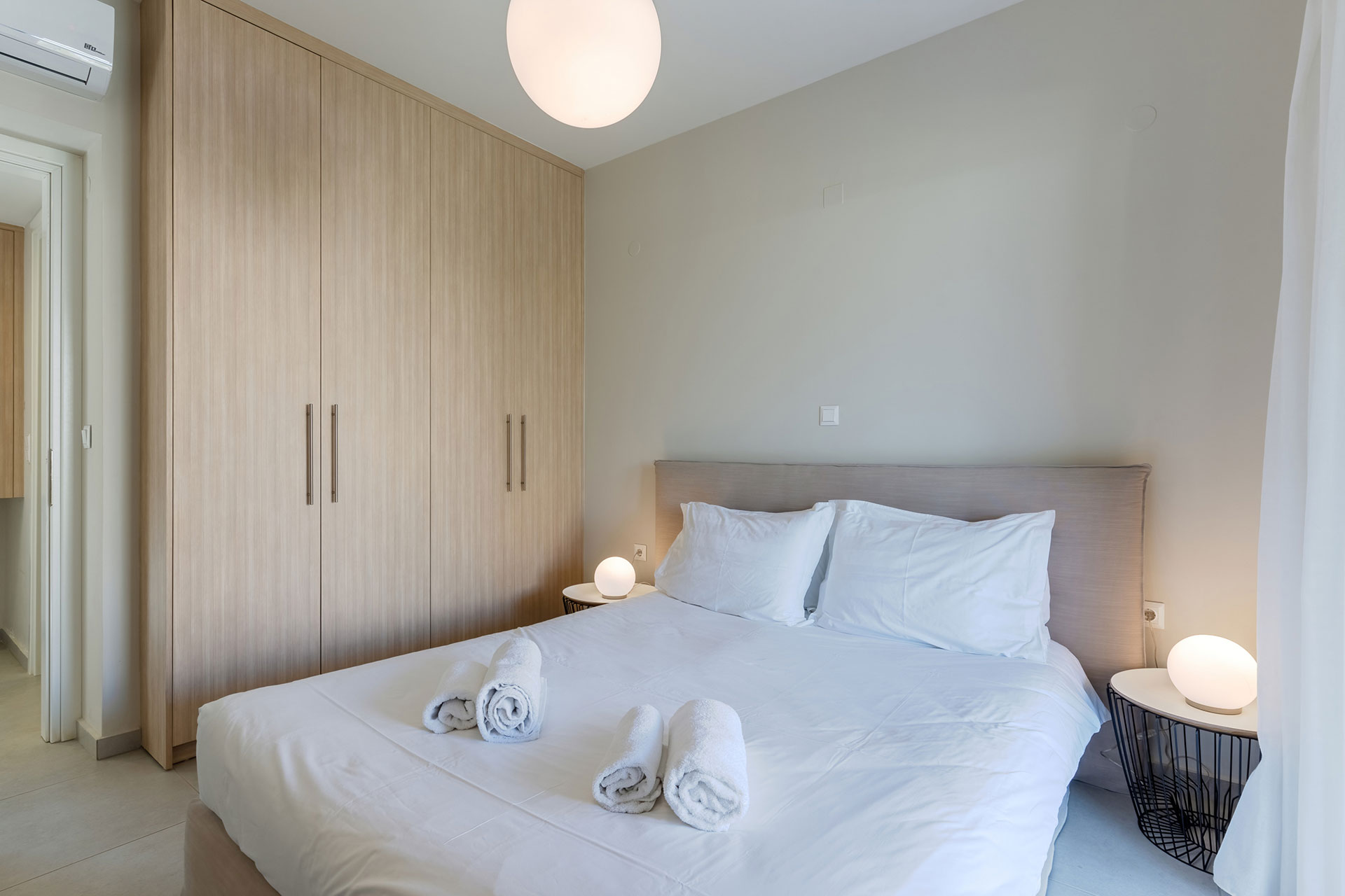 bedroom with double bed and big closet in a two bedrooms superior apartment in plakias, rethymno, crete