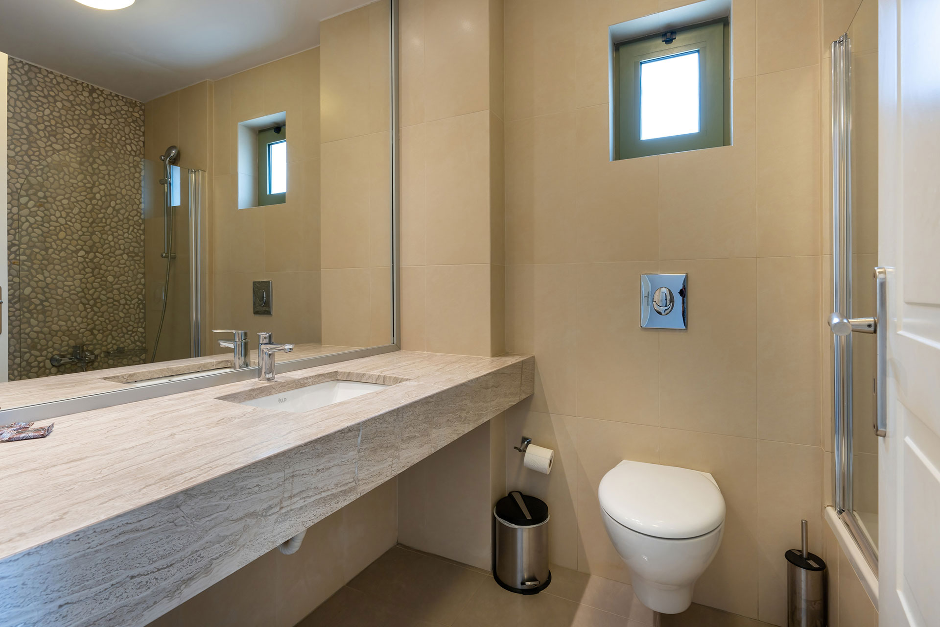 bathroom with bathtub in a three bedrooms villa with sea view in plakias, rethymno, crete