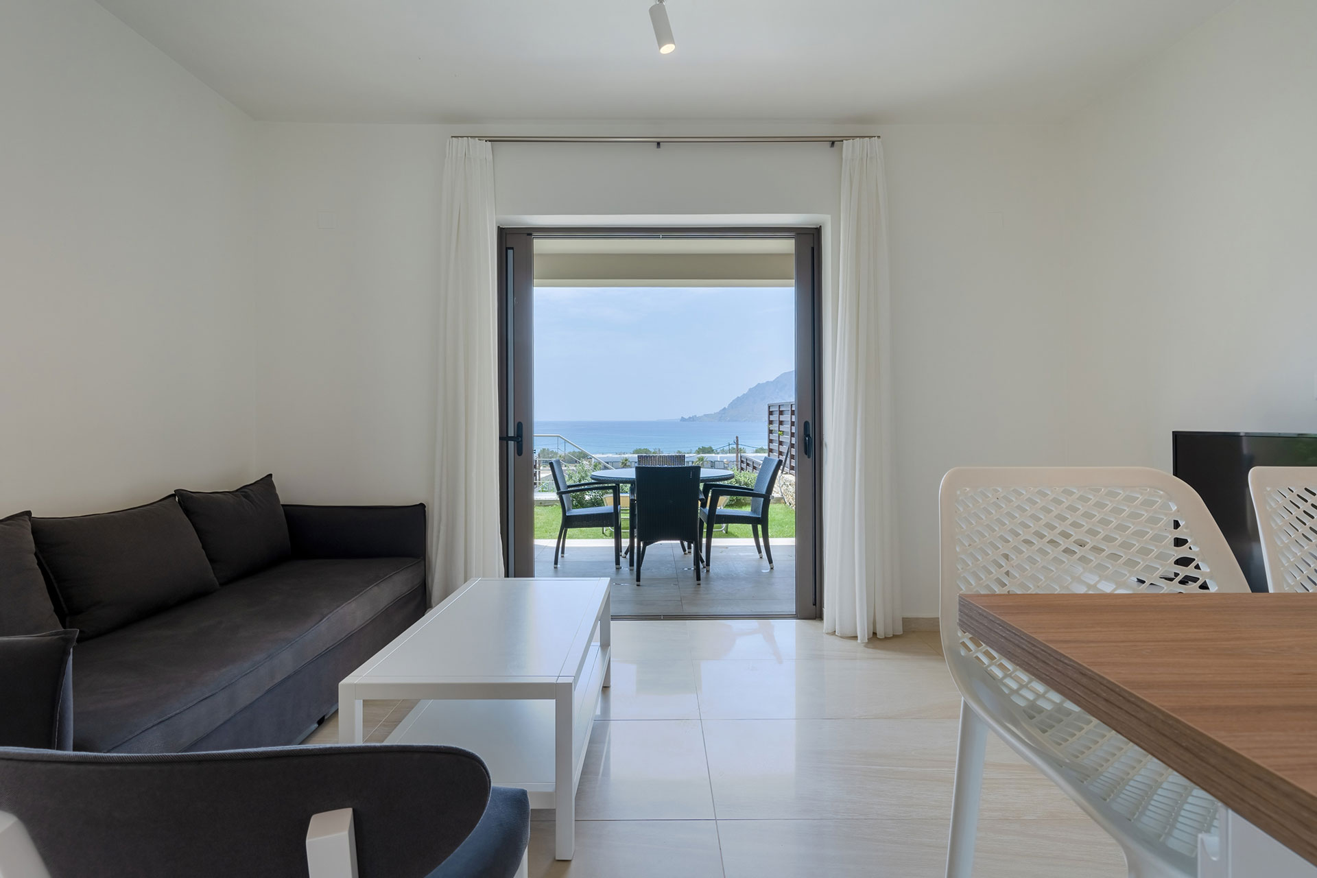 living room with big terrace in a two bedrooms maisonette in plakias, rethymno, crete