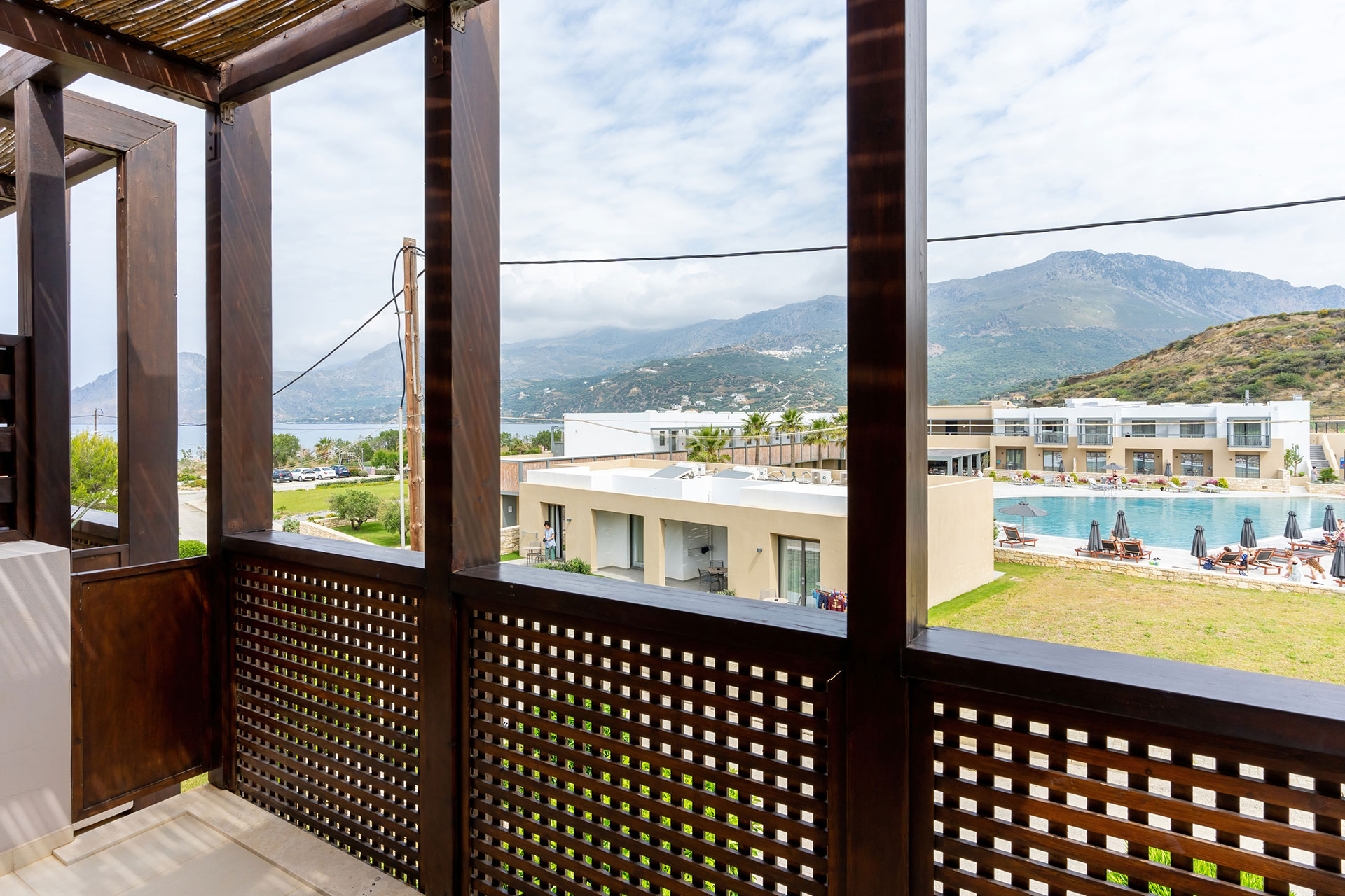 balcony with pool and mountain view in a two bedrooms apartment in plakias, rethymno, crete
