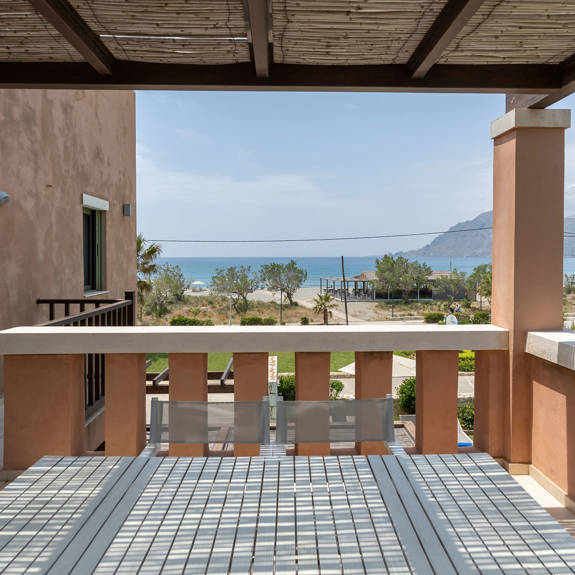 balcony with cane canopy in a three bedrooms villa with sea view in plakias, rethymno, crete