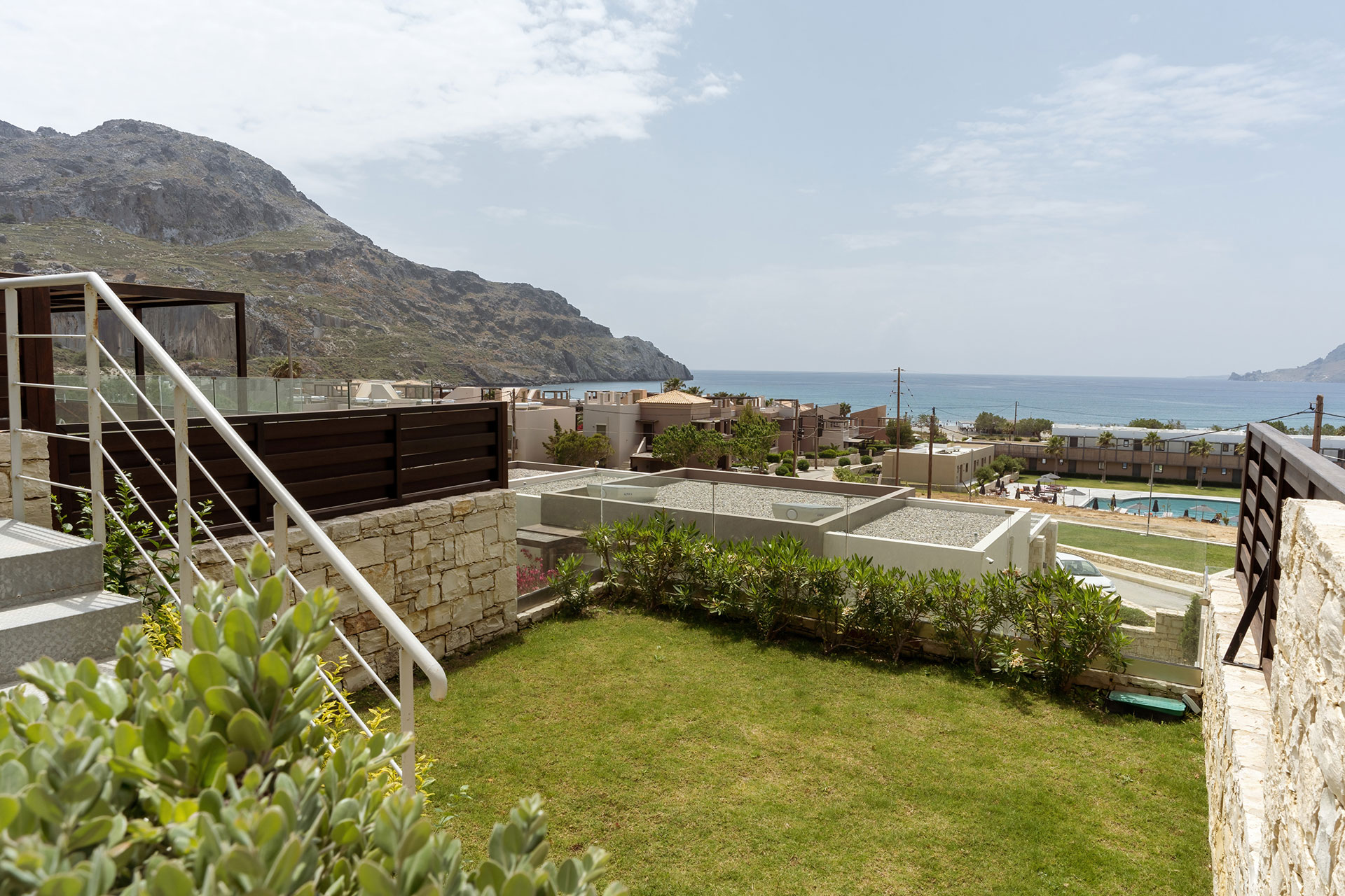 garden with lawn and pool and sea view in a two bedrooms maisonette in plakias, rethymno, crete