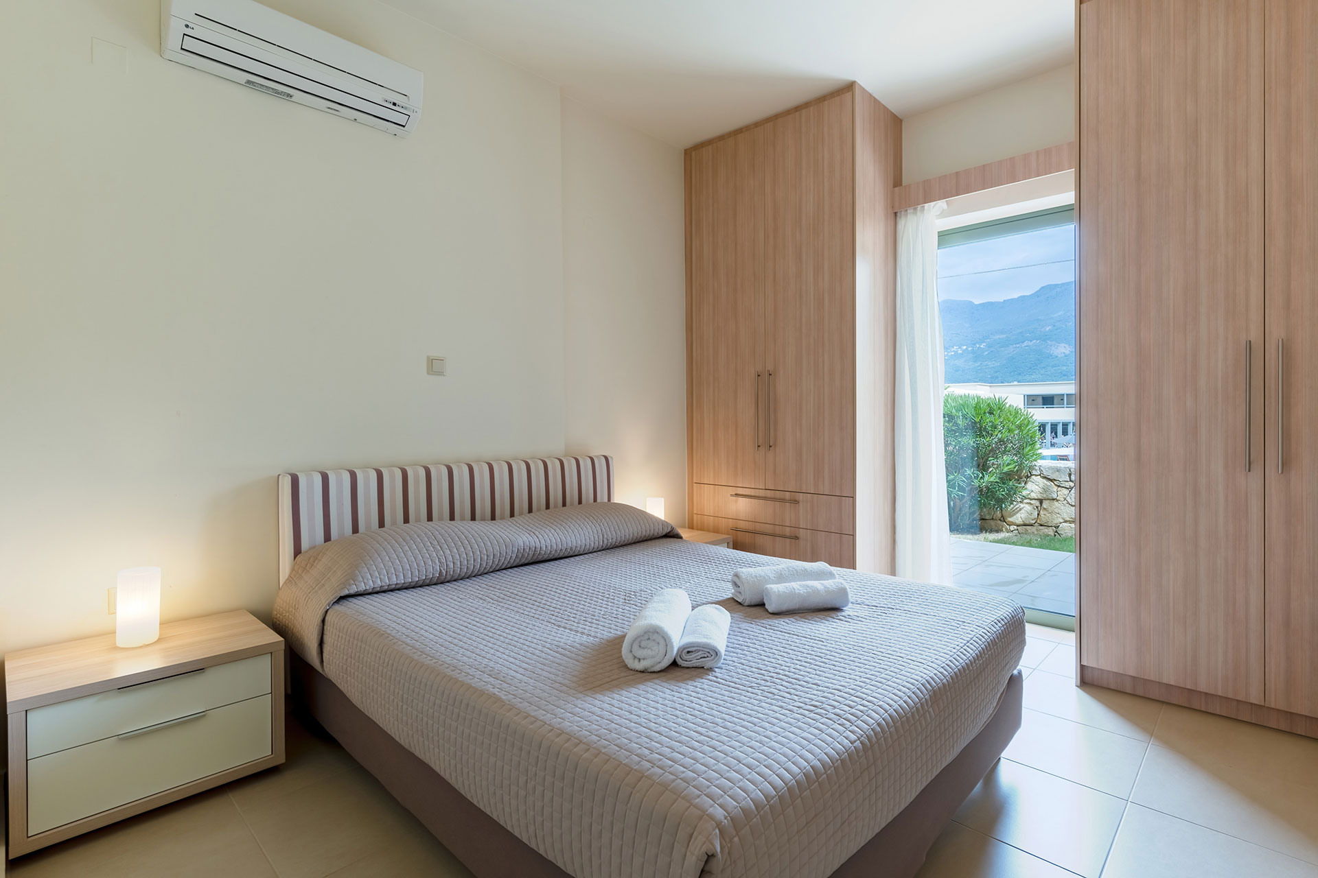 bedroom with double bed and two closets in a two bedrooms apartment in plakias, rethymno, crete
