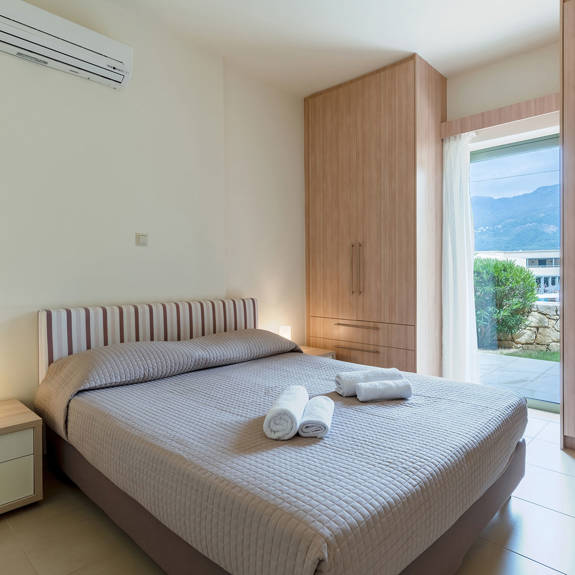 bedroom with double bed and two closets in a two bedrooms apartment in plakias, rethymno, crete