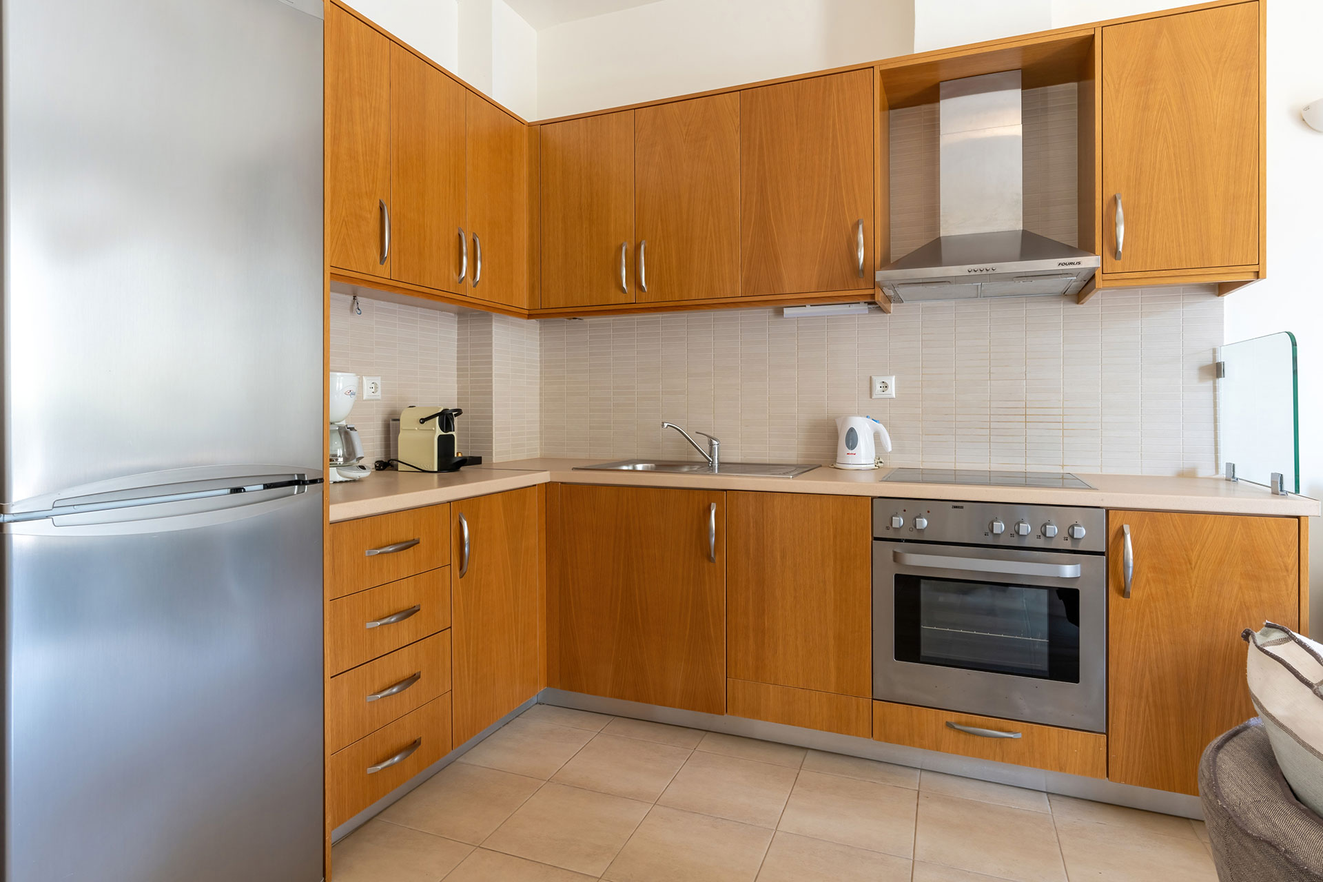 wooden kitchen in a two bedrooms apartment in plakias, rethymno, crete
