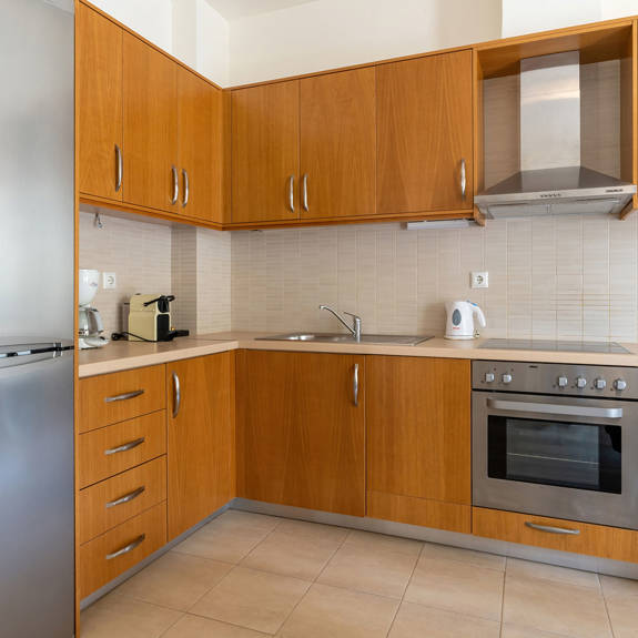 wooden kitchen in a two bedrooms apartment in plakias, rethymno, crete