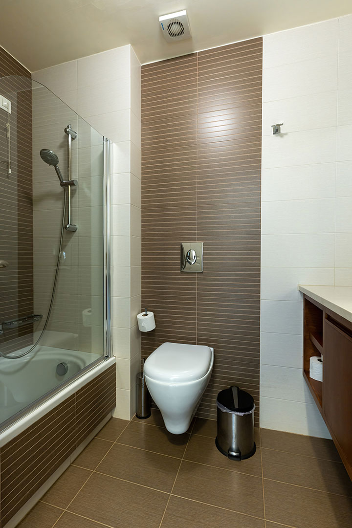 bathroom with bathtub and shower in a two bedrooms apartment in plakias, rethymno, crete