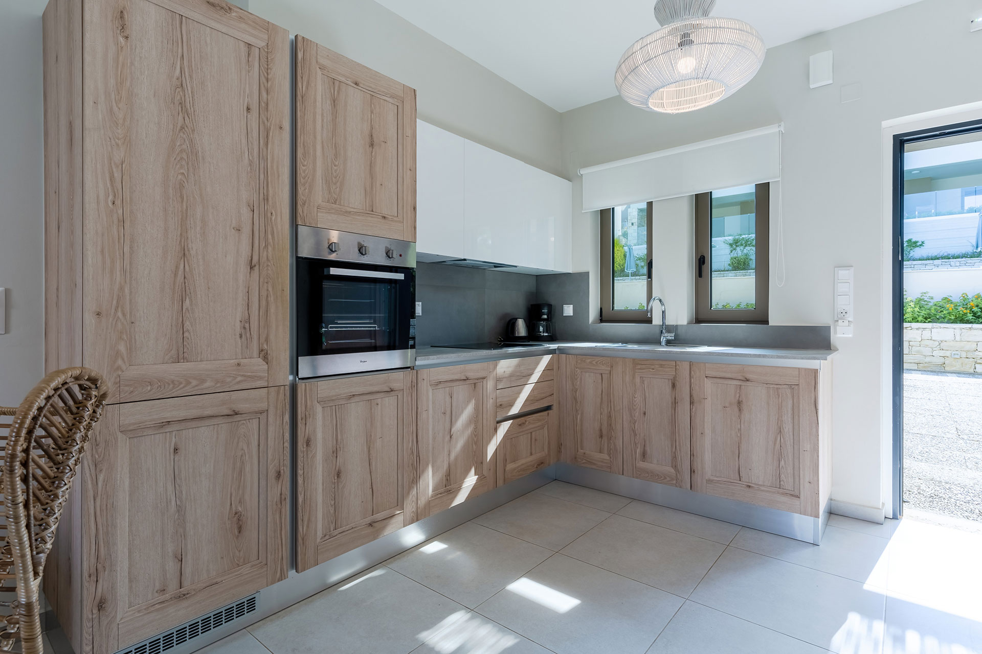 wooden kitchen with garden view in an one bedroom apartment in plakias, rethymno, crete